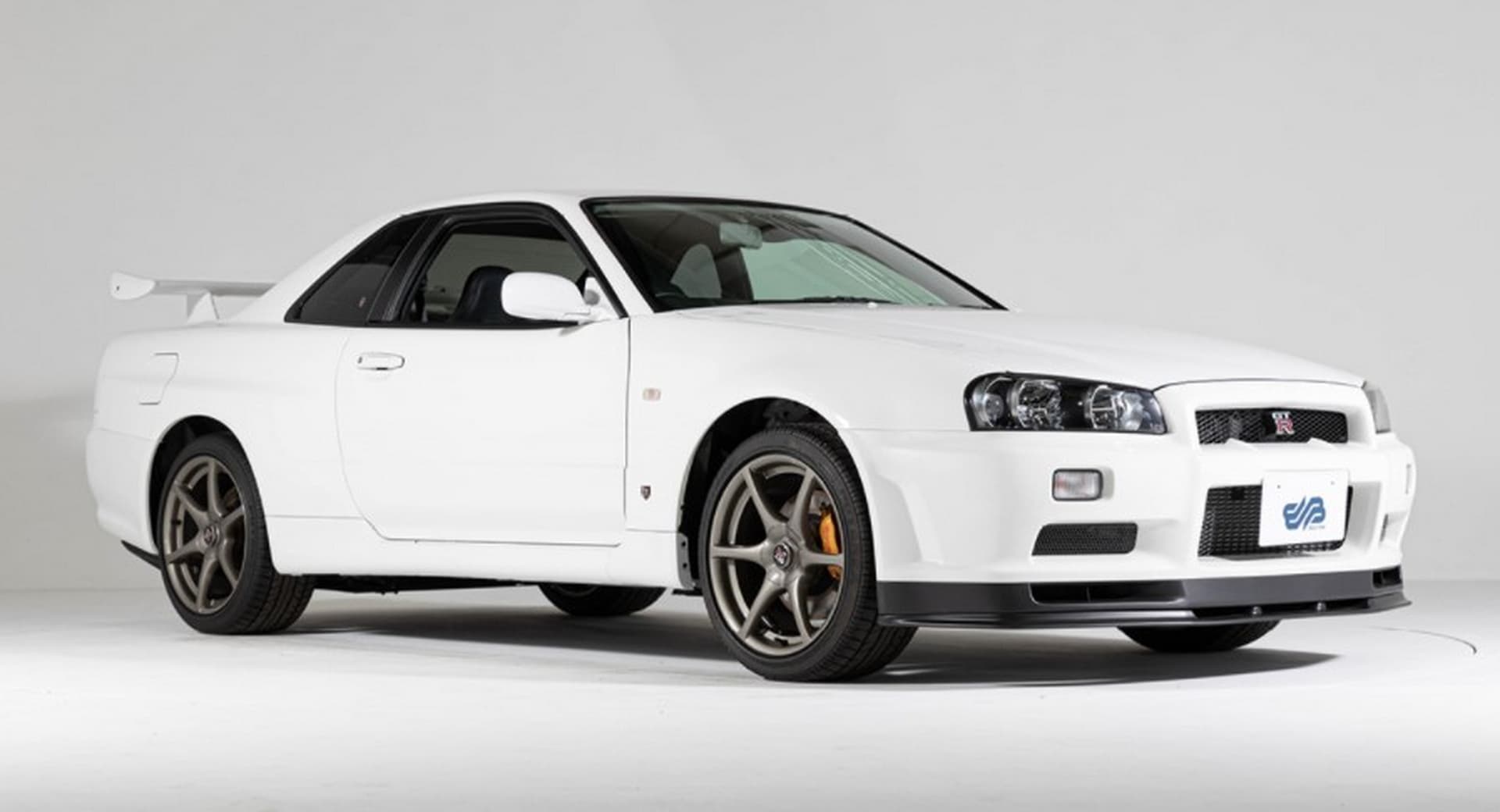 Nissan Skyline GT-R R34 V-Spec II Nur - jarak perbatuan 10 km, bidaan ...