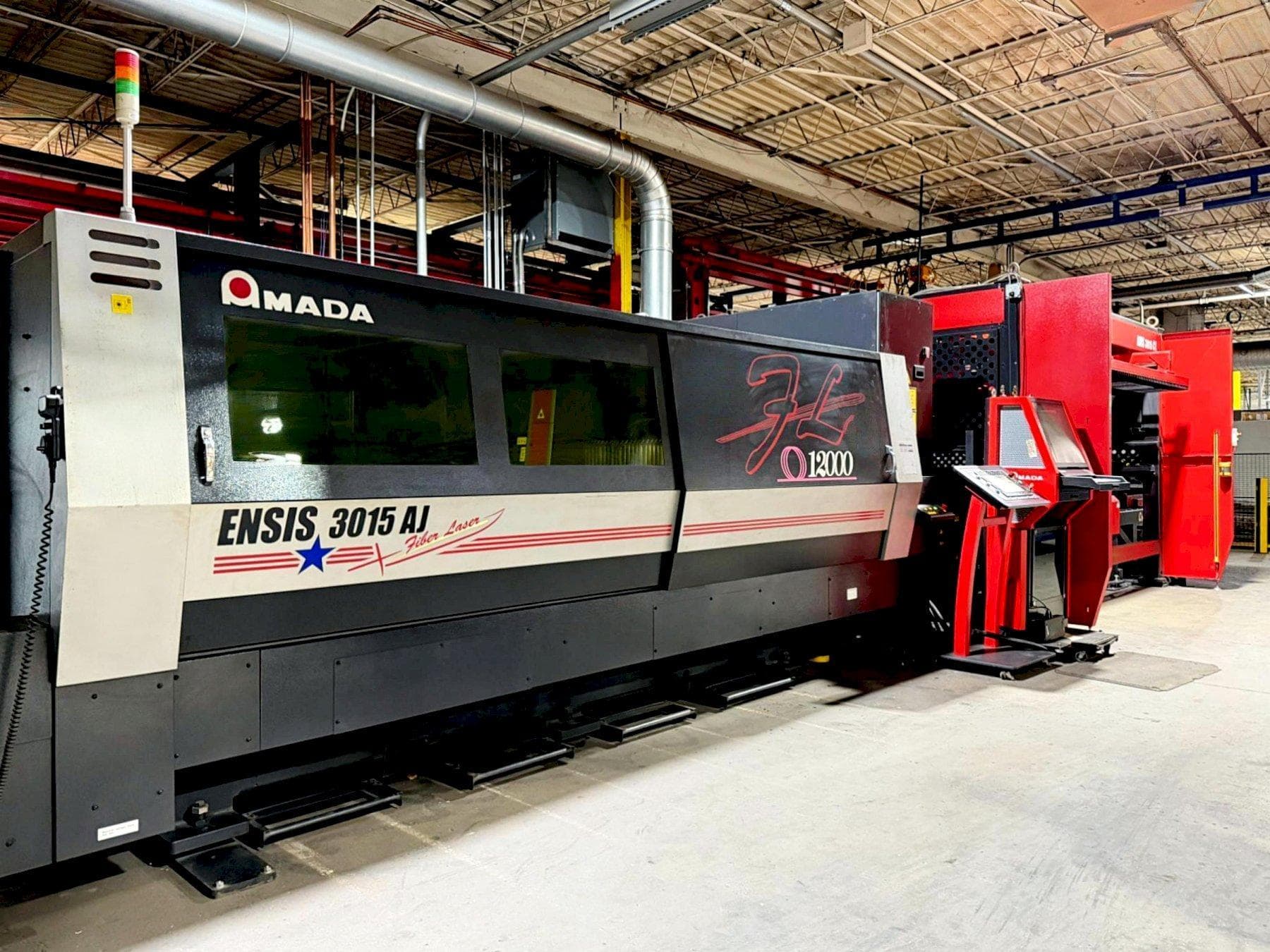 Amada Ensis 3015 AJ 12KW Fiber w/ Automation Used for Sale | Machine Hub
